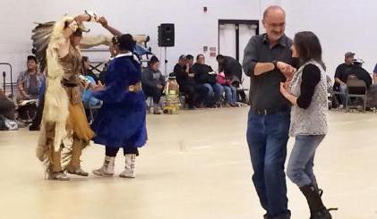 President Tyndall and his wife Audrey dance at the annual Powwow